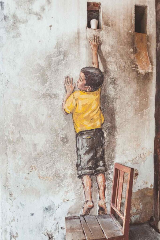 Boy on Chair Penang Street Art & Mural